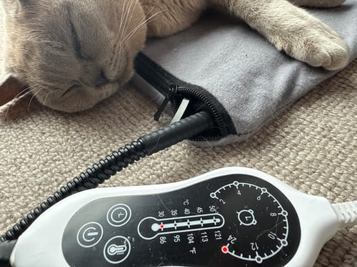 Customer photo review of Electric Heating Pet Bed Mat Heated Blanket Pad Timers Removable Cover