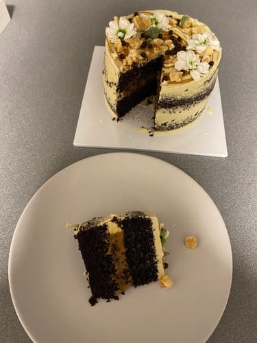 Customer photo review of chocolate caramel cake