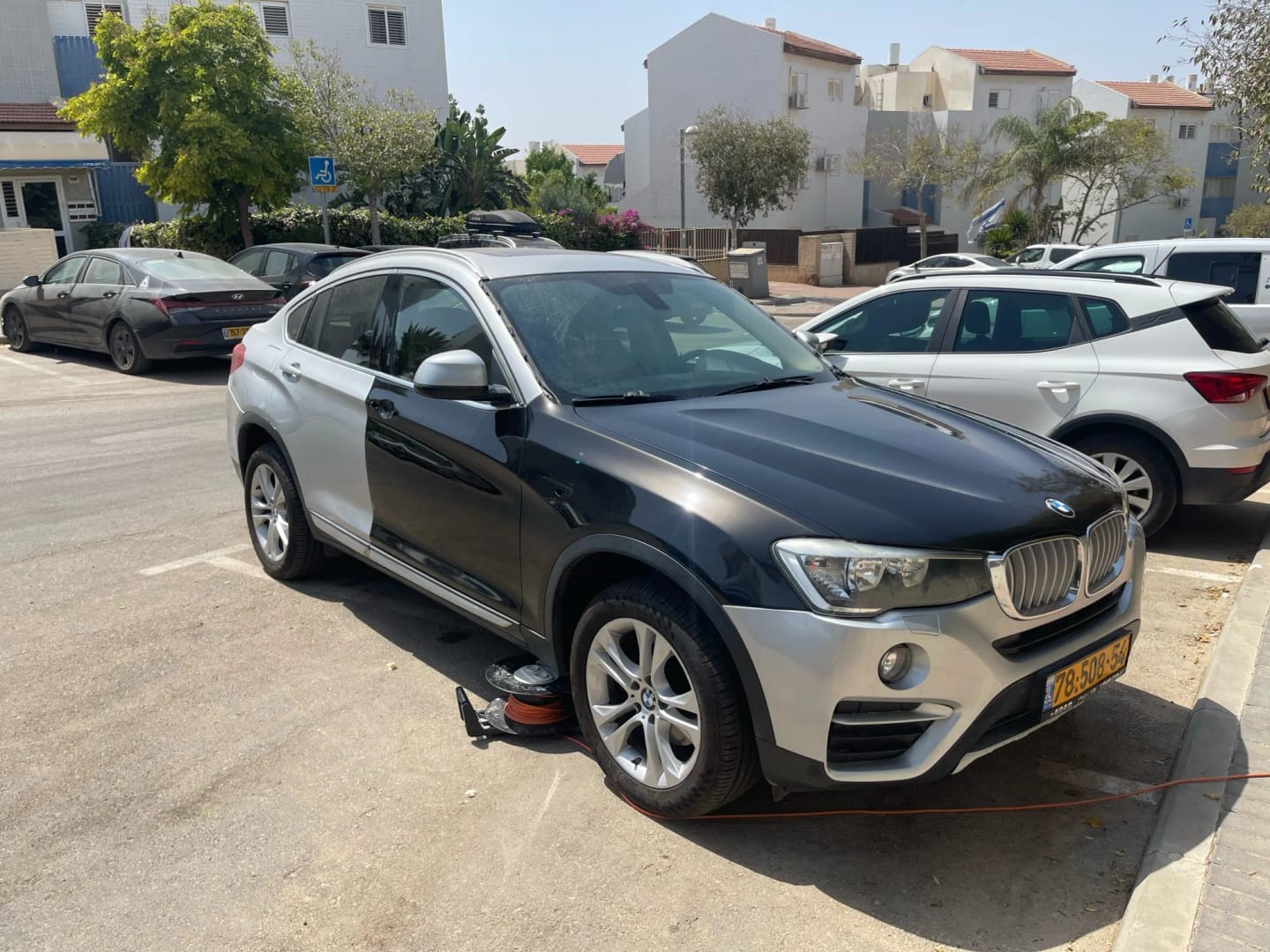 Customer photo review of Mallcas™ Glossy Liquid Metallic Black Vinyl Wrap (PET Liner)