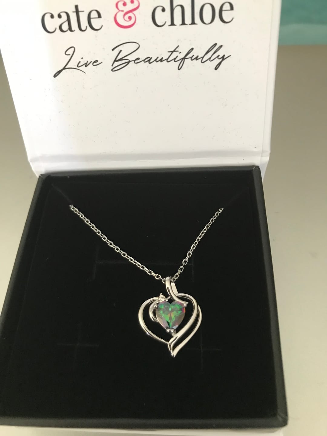 Customer photo review of Regina 18k White Gold Plated Blue Heart Necklace with Swarovski Crystals