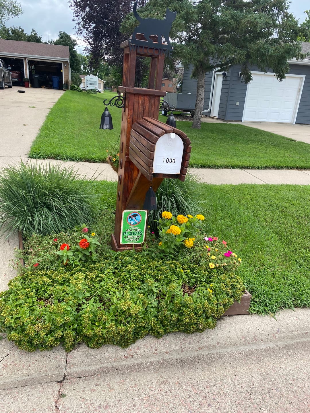Customer photo review of Please Give Our Plants a Fighting Chance - Metal Sign