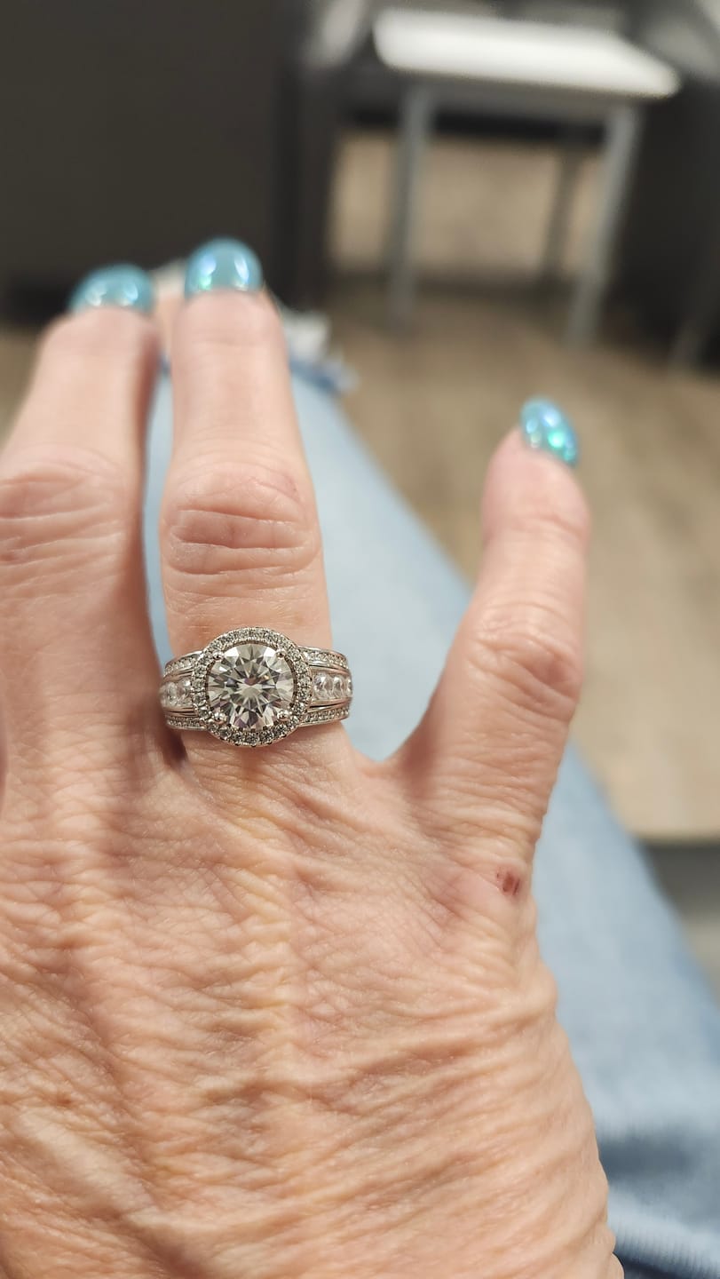 Customer photo review of Halo Moissanite Graduated Triple Row Pave Engagement Ring