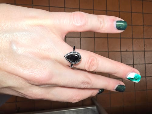 Customer photo review of Louily Unique Pear Cut Halo Black Diamond Engagement Ring In Sterling Silver