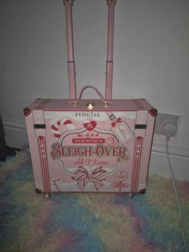 Customer photo review of P.Louise Sleigh Over Suitcase Packaging
