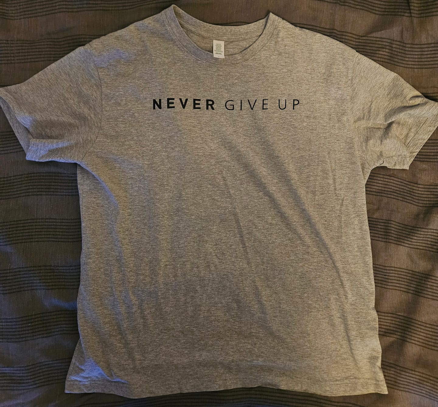 Customer photo review of Never Give Up T-shirt