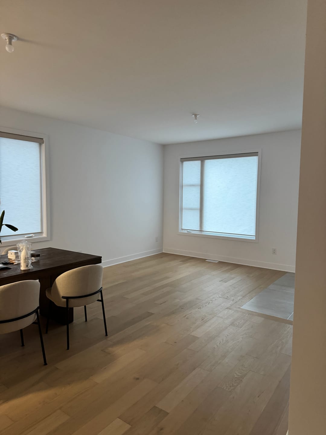 Customer photo review of SmartWings Motorized Light Filtering Roller Shades 70% Blackout Essential