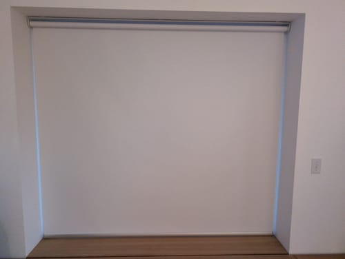 Customer photo review of SmartWings Motorized Roller Shades 100% Blackout Vinyl