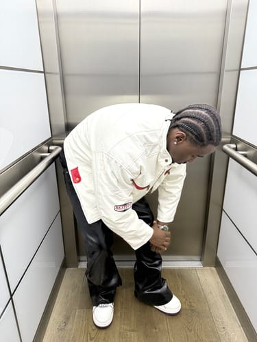 Customer photo review of High Street Coated Glossy Flare Jeans