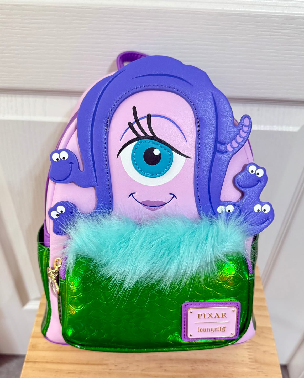 Customer photo review of Loungefly Pixar's Monsters Inc. Celia Cosplay Mini Backpack