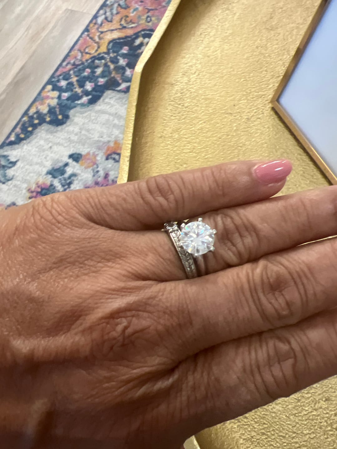 Customer photo review of Classic Solitaire Moissanite Six-Prong Sterling Silver Engagement Ring