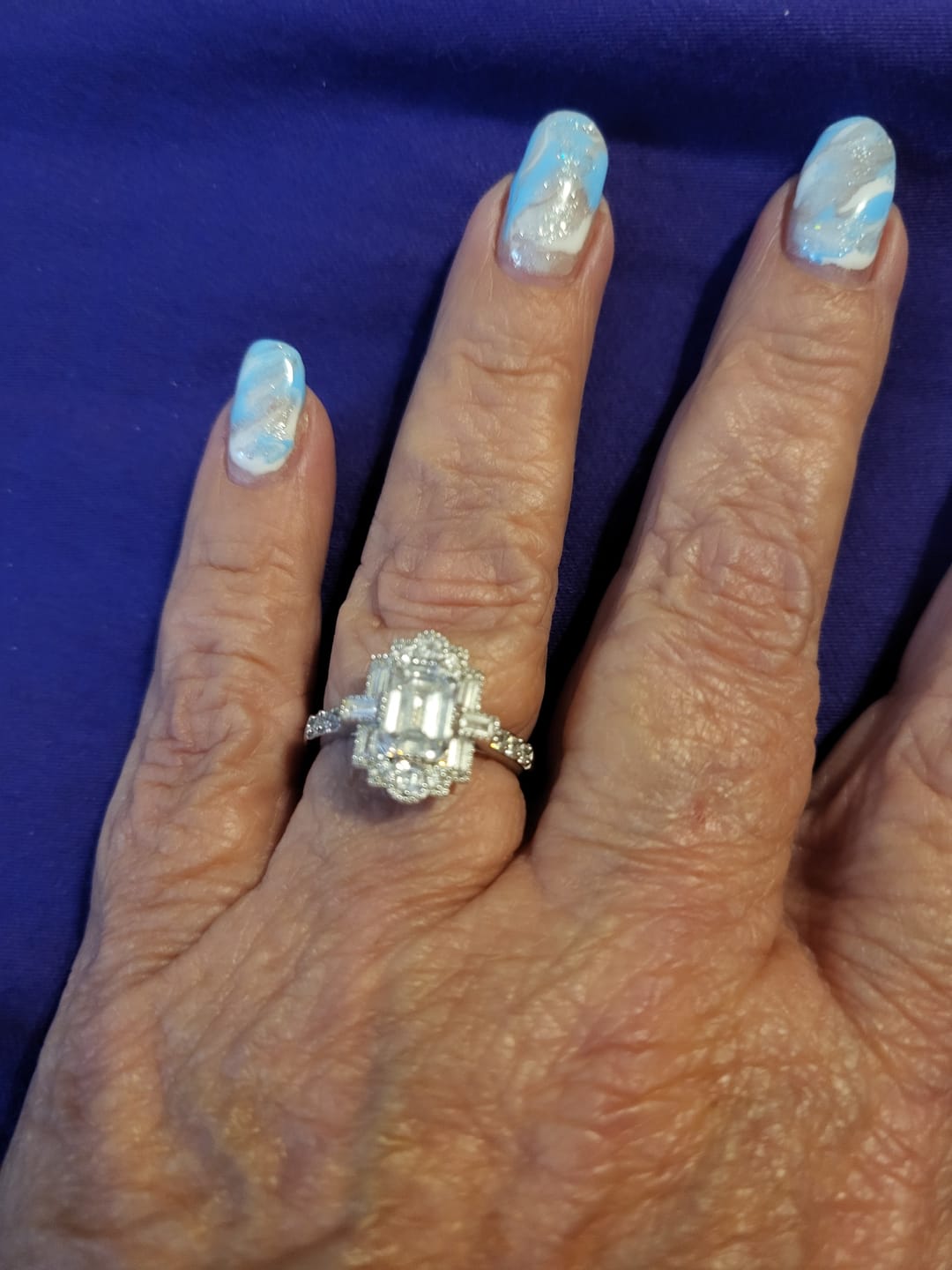 Customer photo review of Art Deco Emerald Cut Moissanite Milgrain Engagement Ring
