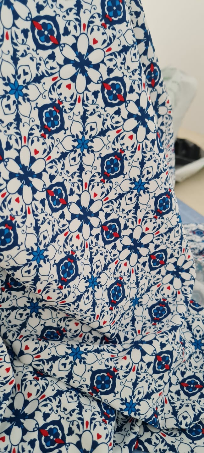 Customer photo review of Blue/Red Abstract Floral on White Lycra Spandex Fabric