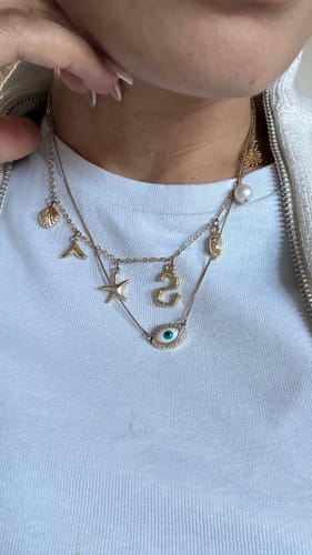 Customer photo review of GOLD OCEAN LETTER NECKLACE