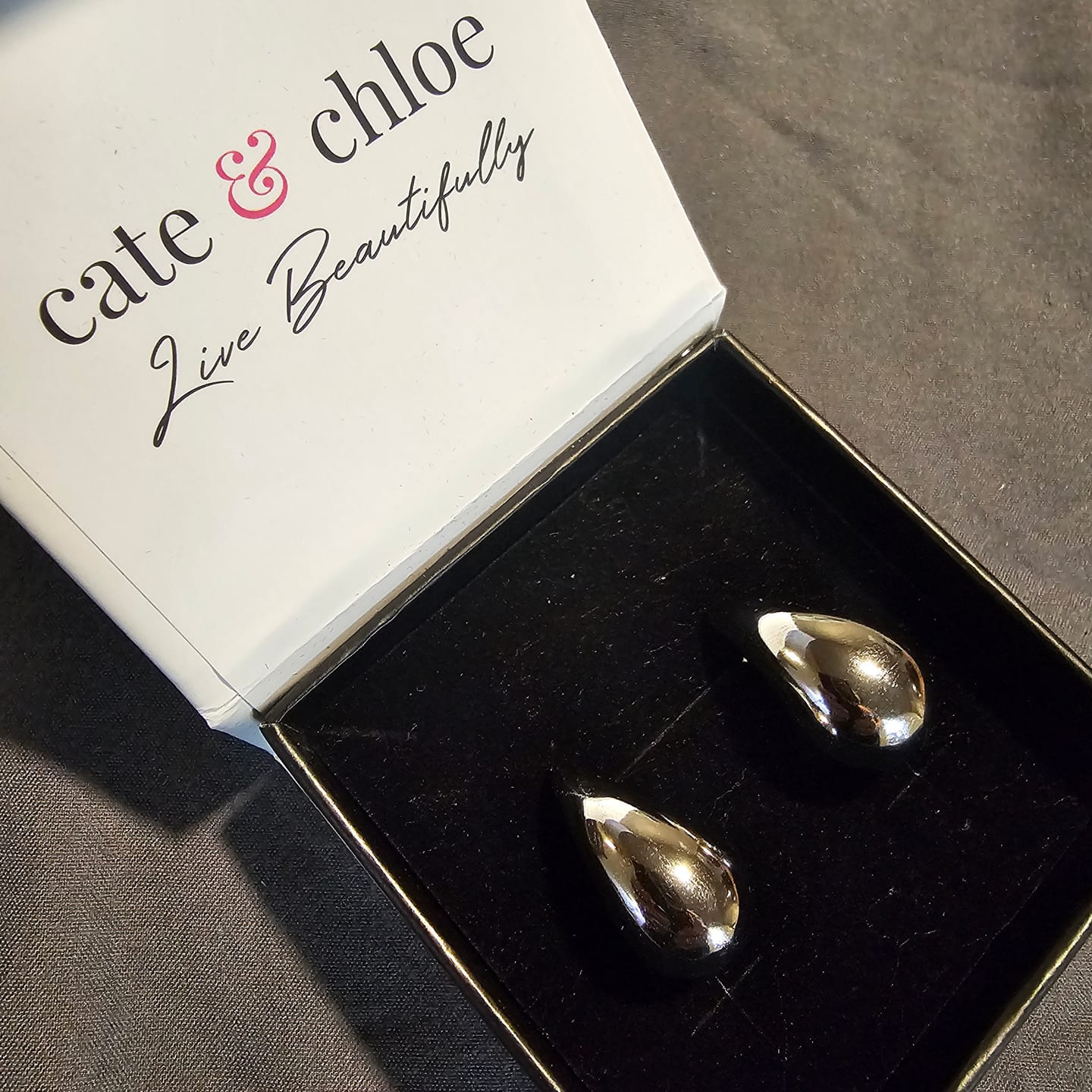 Customer photo review of Olive 18k White Gold Plated Teardrop Stud Earrings