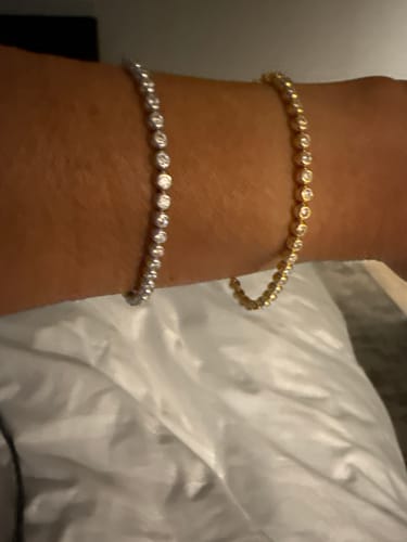 Customer photo review of CLASSICA 6 Carat Round Flawless Three-Prong Martini Stud Earrings 14K Yellow Gold Vermeil