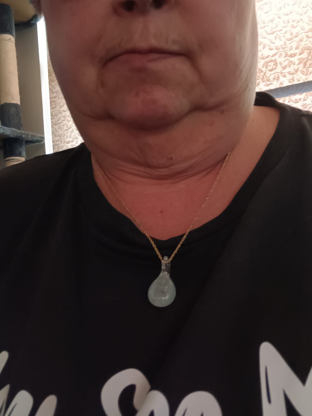 Customer photo review of Glow in the Dark Pendant with Infused Cremation Ashes