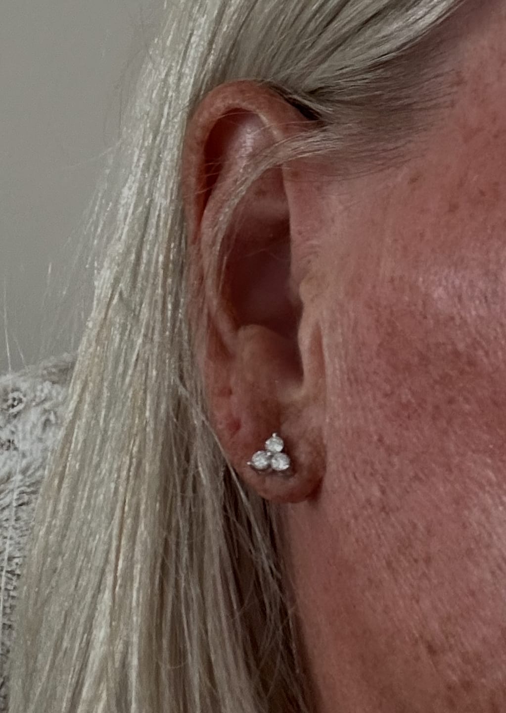 Customer photo review of Trinity Moissanite Sleep Stud Earrings