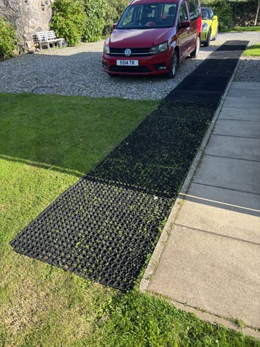 Customer photo review of Heavy Duty Rubber Grass Mats - 23mm Thick, Non-Slip, Weather-Resistant, Wheelchair Friendly, Ideal for Car Parks & Grass Areas, Recycled Rubber