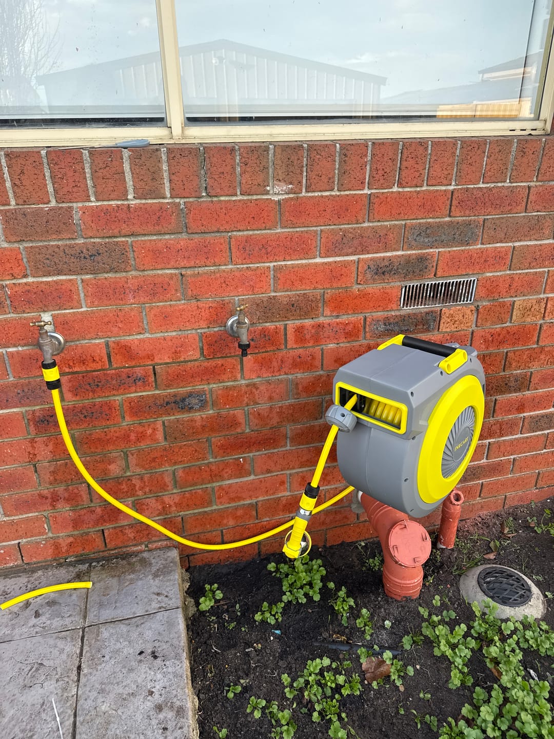 Customer photo review of 30m Retractable Garden Hose Reel.. Fully Installed