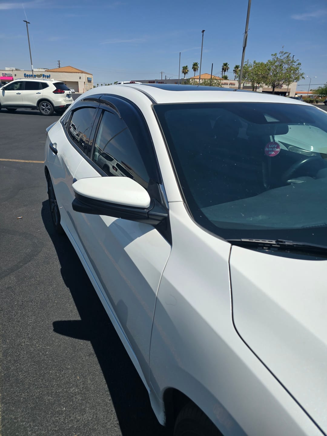Customer photo review of 2016-21 Honda Civic Hatchback Tape-On Window Visors Wind Deflectors Rain Guards