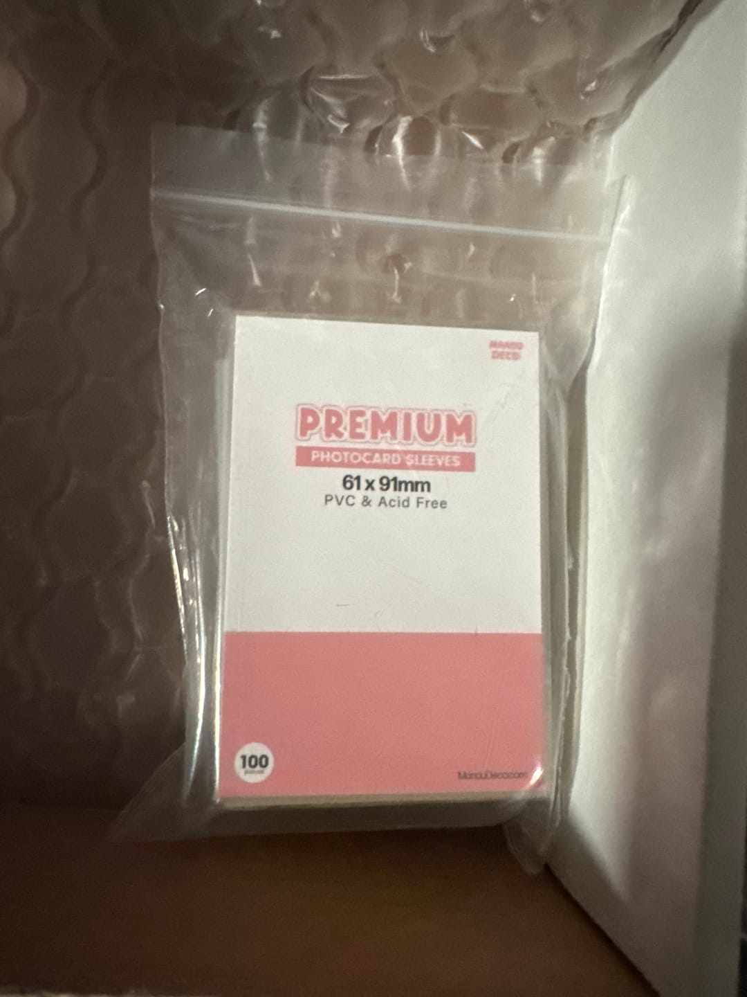 Customer photo review of PREMIUM PHOTOCARD SLEEVES - PINK VERSION (61x91MM)