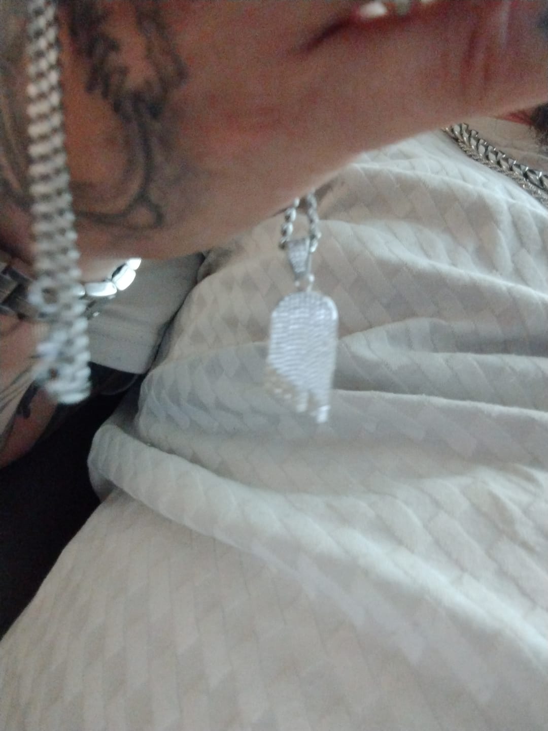 Customer photo review of ICED OUT Broken Deck Pendant (Silver)