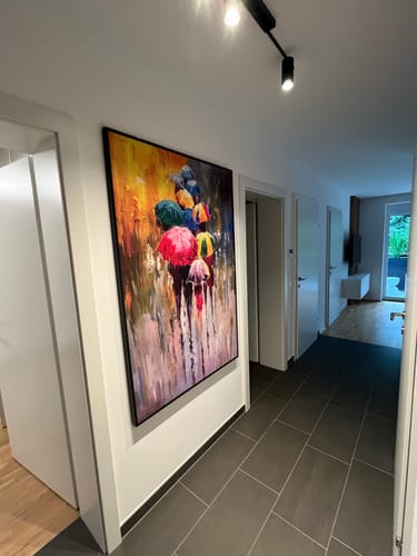 Customer photo review of Passeggiata sotto la pioggia