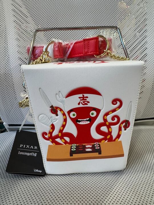 Customer photo review of Loungefly Disney Pixar Monsters Inc Harryhausen's Take Out Crossbody Bag