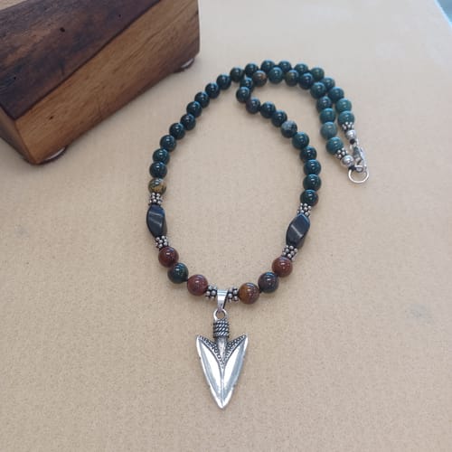 Customer photo review of Sterling Silver Southwestern Style Arrowhead Unisex Pendant