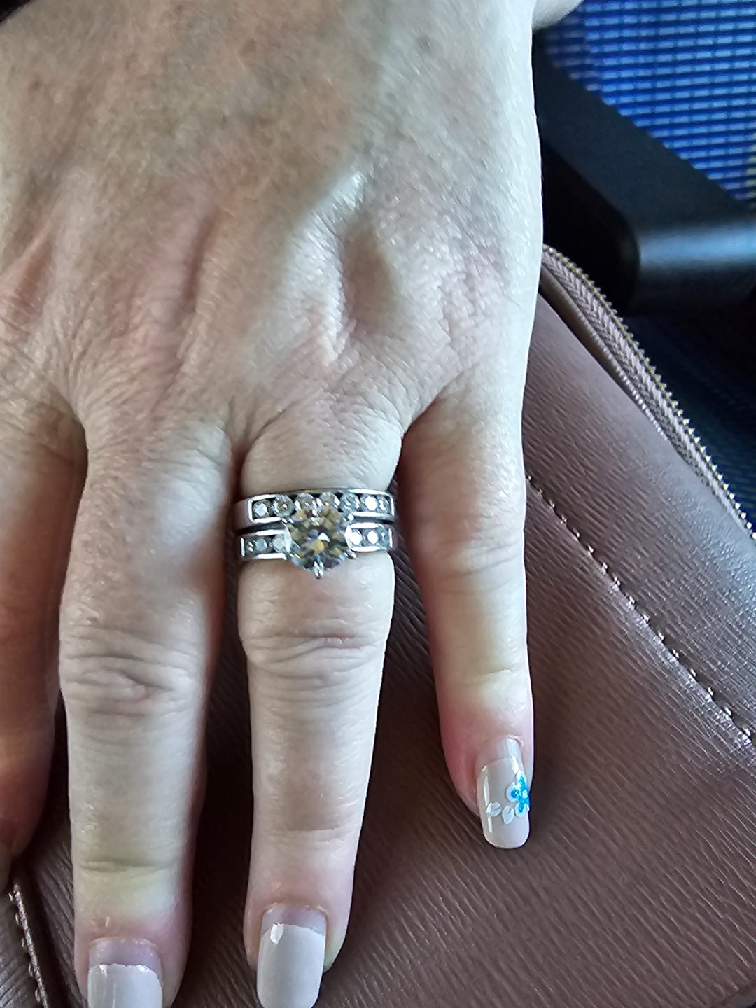 Customer photo review of Channel Set Moissanite Half Eternity Wedding Band Ring In Sterling Silver
