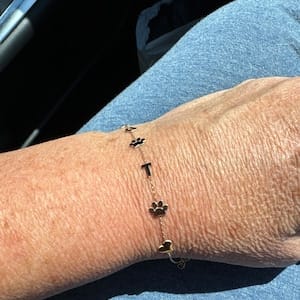 Customer photo review of 14K Solid Gold Paw Print Bracelet