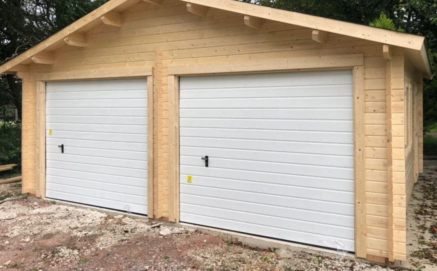 Customer photo review of Roger XL (6x5.3m | 28.4m2 | 44mm) Timber Log Double Garage with Sectional Doors