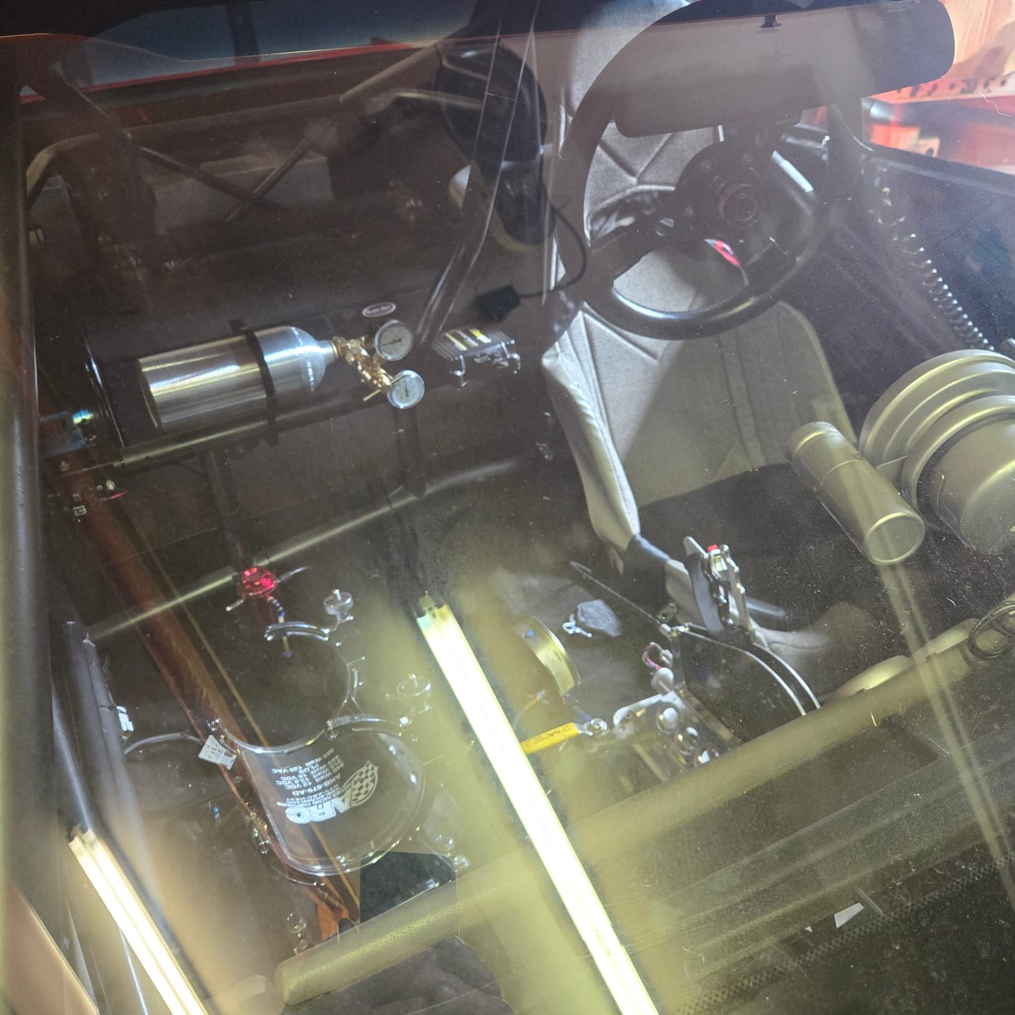 Customer photo review of Billet High Clearance Roll Bar Helmet / Steering Wheel Hook 1.625" 43-10001