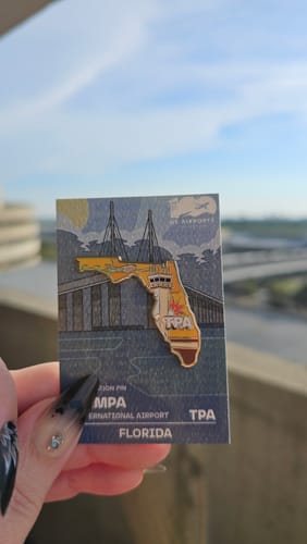 Customer photo review of Airport Enamel Pin | TPA - Florida