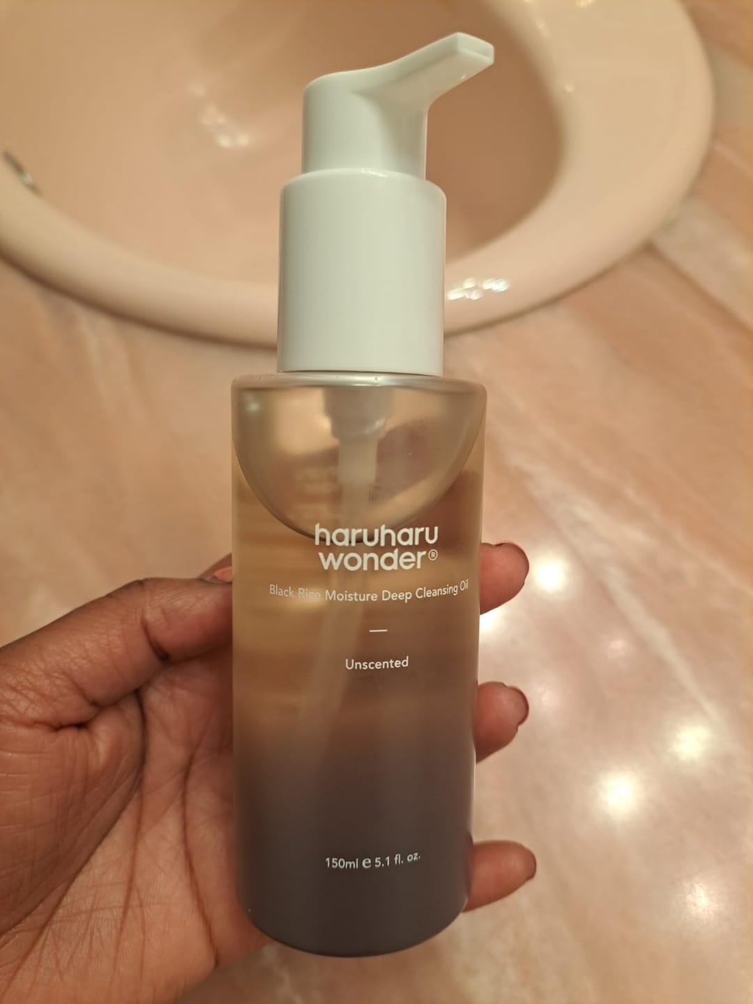 Customer photo review of BLACK RICE moisture cleansing oil