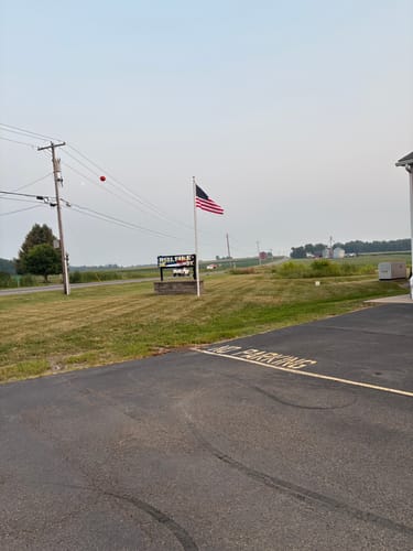 Customer photo review of 20 ft. Commercial Flagpole with External Rope Halyard Rated At 110 mph