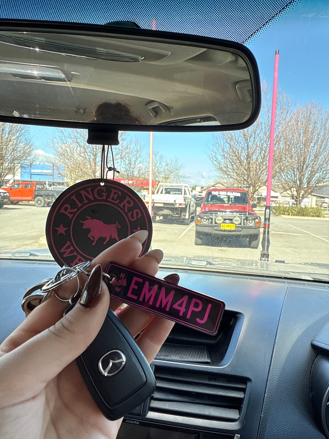 Customer photo review of NSW Colour on Black Licence Plate Custom Keychain