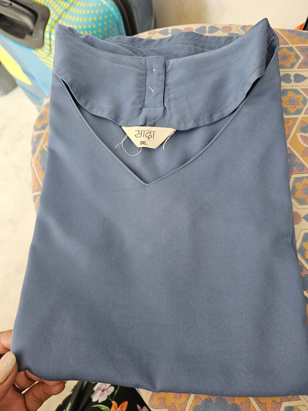 Customer photo review of Women English Blue V-Neck Sleeveless Top