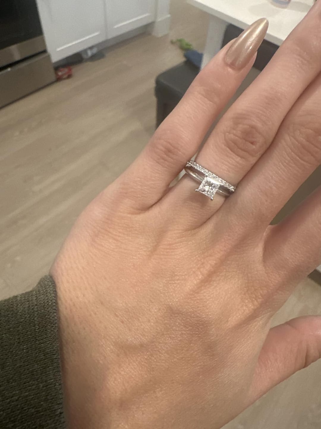 Customer photo review of S925 Half Halo Moissanite 0.5 Ct Round Cut White/Green Stone Anniversary Ring
