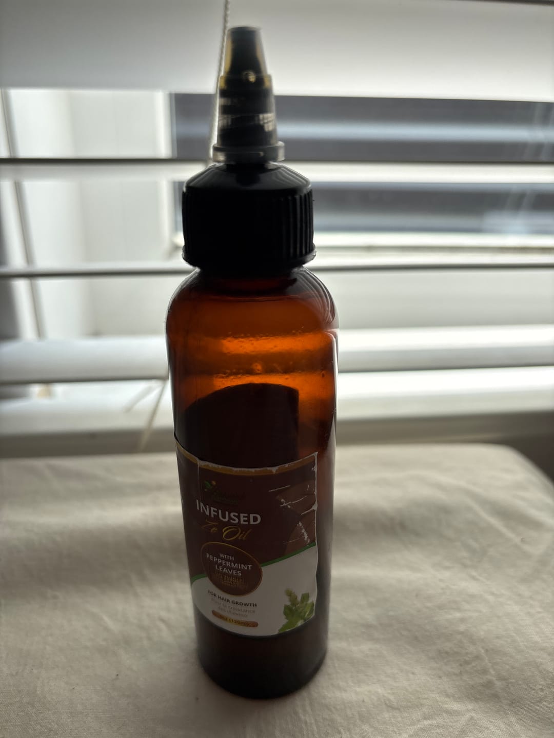 Customer photo review of Infused Ze Oil – Herbal Scalp & Hair Elixir (Growth Oil)