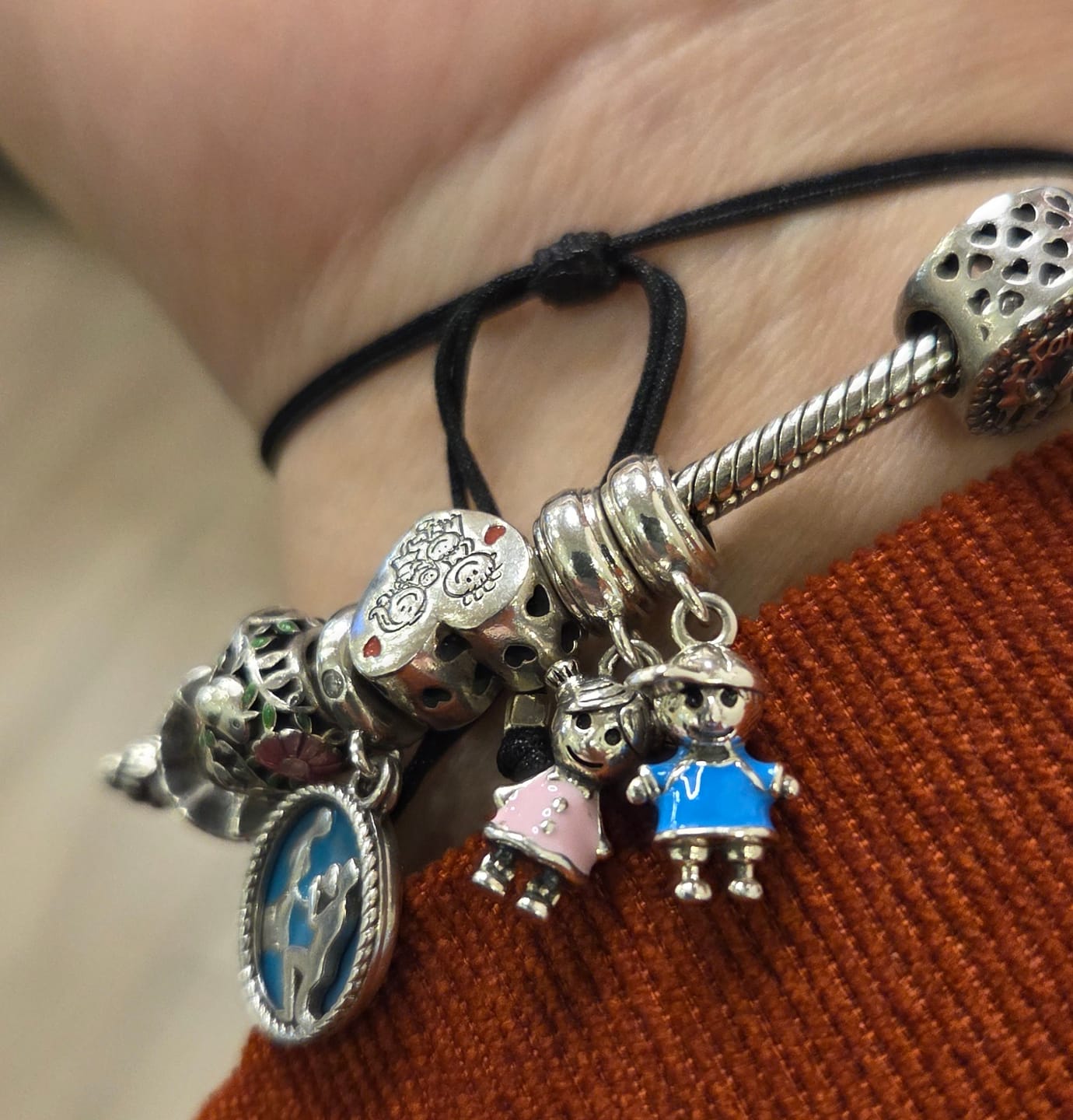 Customer photo review of Charm Niño Colgante Celeste