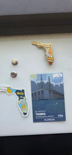 Customer photo review of Airport Enamel Pin | TPA - Florida