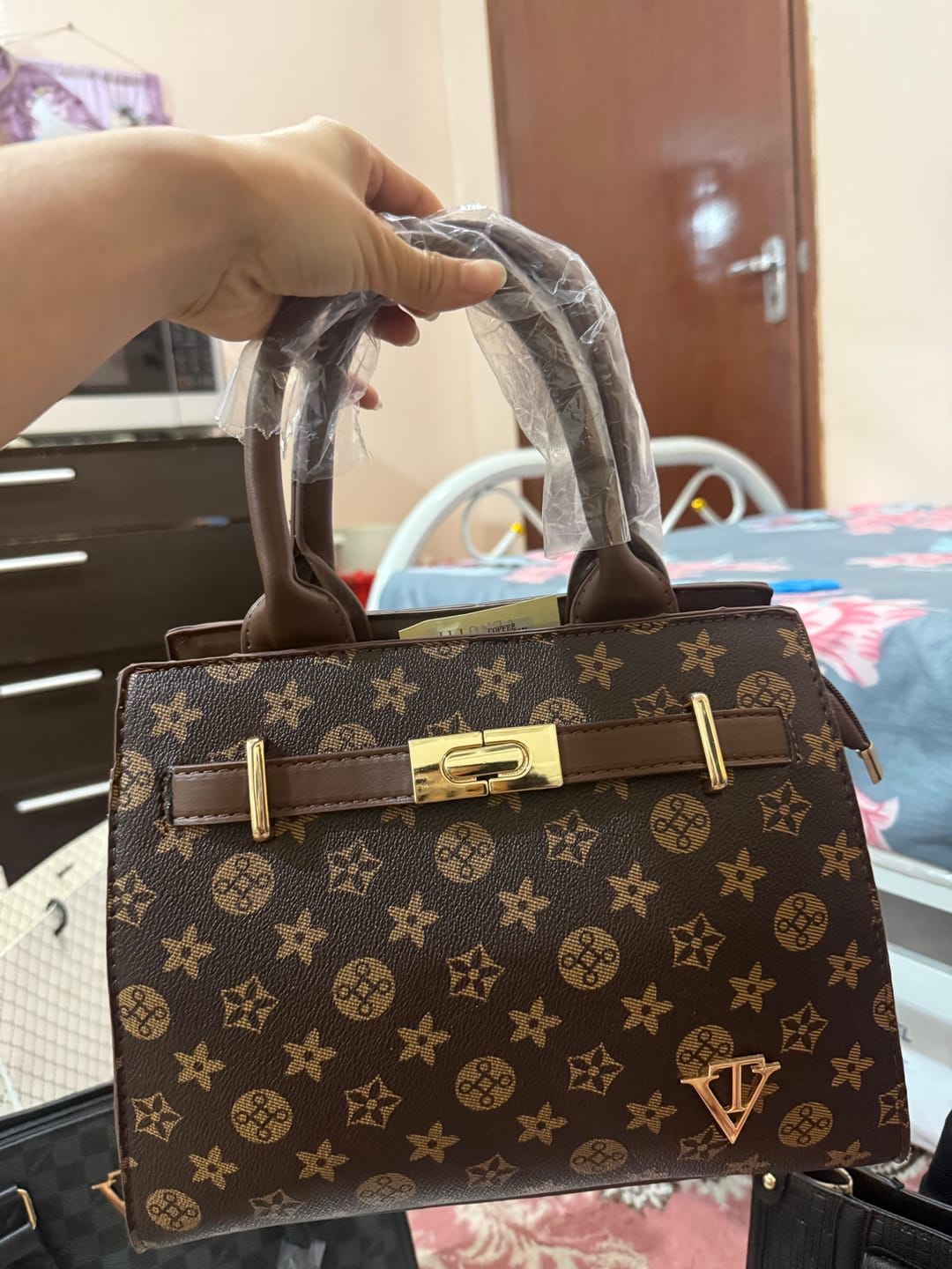 Customer photo review of flora Regal Handbag