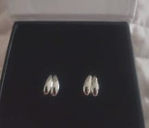 Customer photo review of Shae 18k White Gold Plated Semi-Hoop Curved Stud Earrings