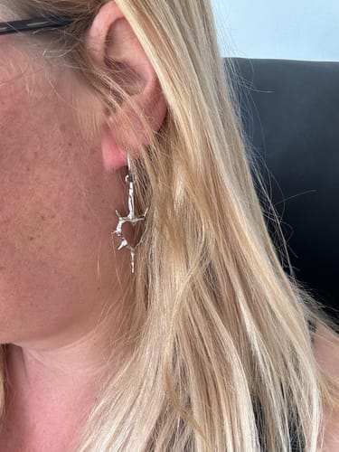 Customer photo review of Heart of Thorns Earrings
