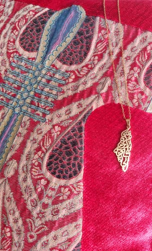 Customer photo review of Palestine Calligraphy Map Necklace