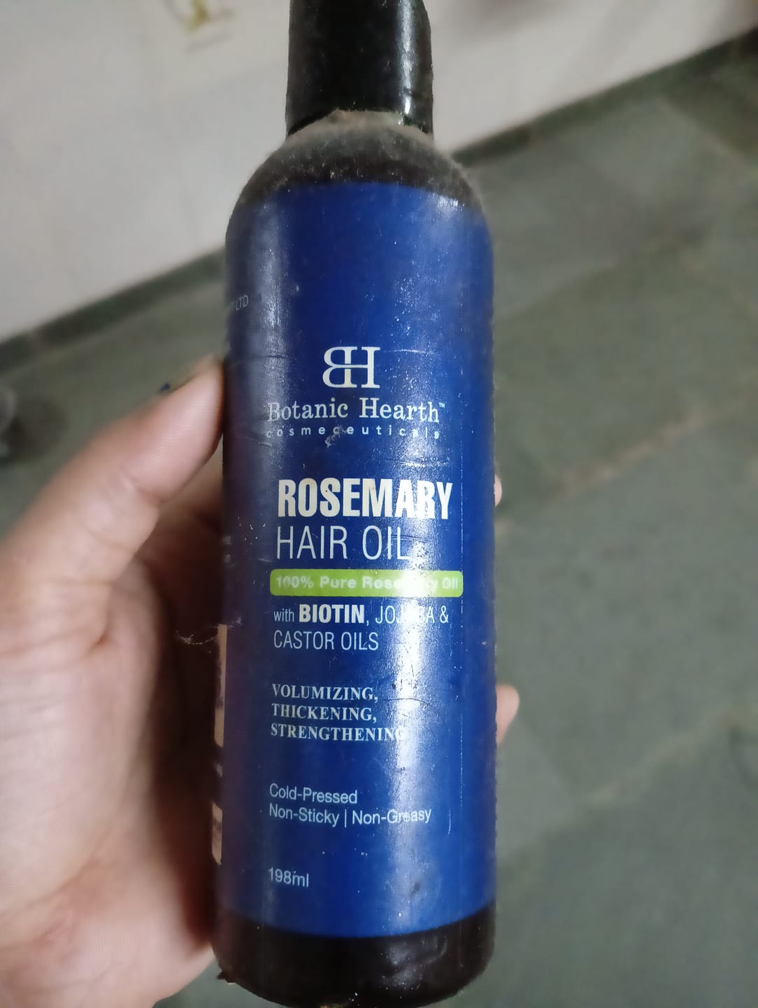Customer photo review of 100% Pure Rosemary Oil For Hair Growth Infused With Biotin - 198ml