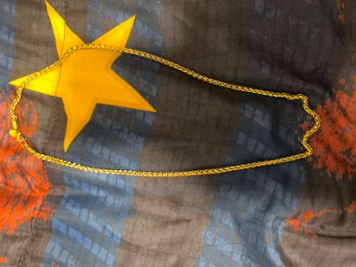 Reseña con foto de un cliente sobre Cadena Snake