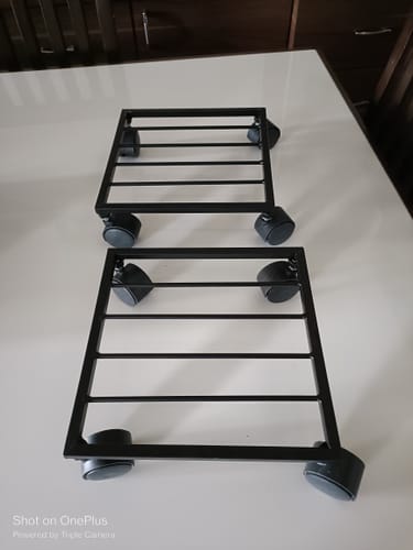 Customer photo review of United Crafts Rozy Wheel Pot Stands for Planters