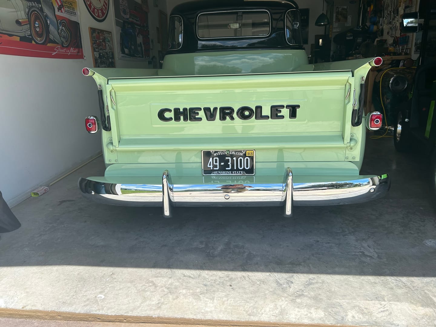 Customer photo review of BLACK FLORIDA LICENSE PLATE WITH WHITE TEXT - SUNSHINE STATE 12x6